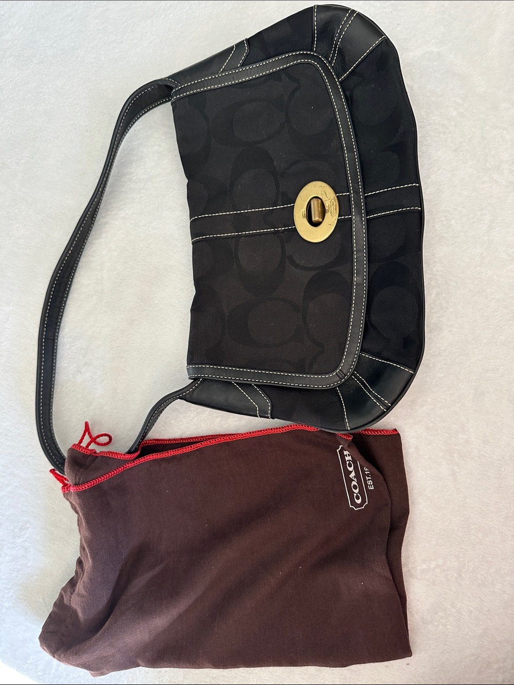 Coach Black Signature Canvas Shoulder Bag with Gold Turnlock Accent